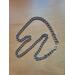 Stainless steel chain necklace laid in a different way. This point of view shows the chain is shining.